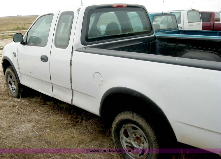 image for item 8707 1999 Ford F150 extended cab pickup truck
