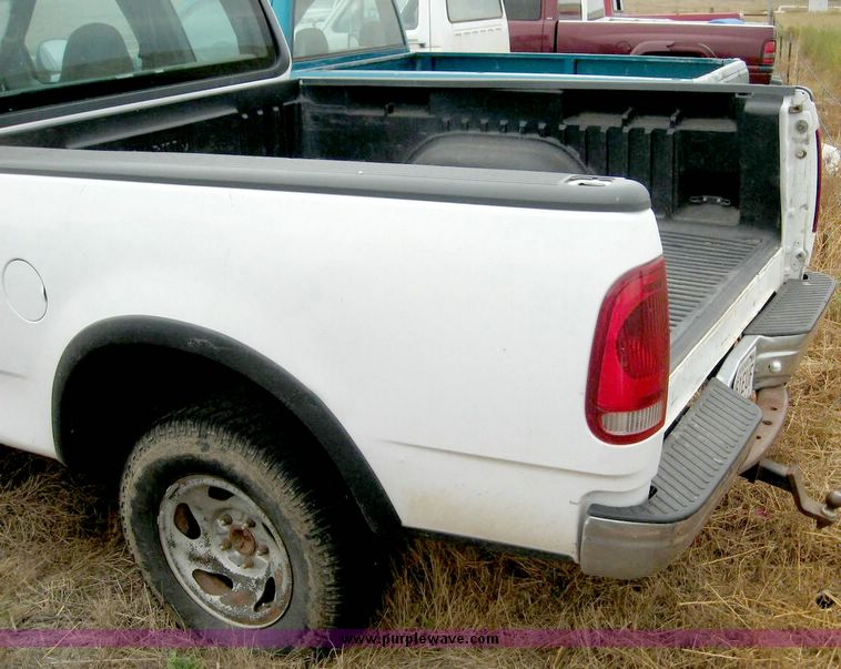 image for item 8707 1999 Ford F150 extended cab pickup truck