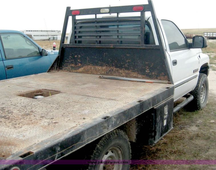 image for item 8709 2002 Dodge Ram 2500 pickup truck with flat bed