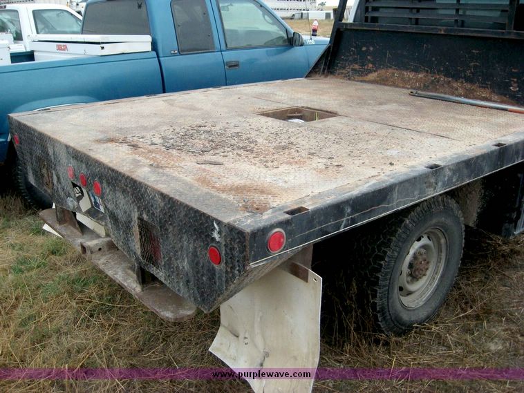 image for item 8709 2002 Dodge Ram 2500 pickup truck with flat bed