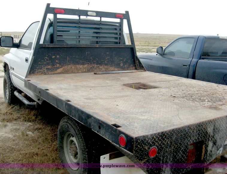 image for item 8709 2002 Dodge Ram 2500 pickup truck with flat bed