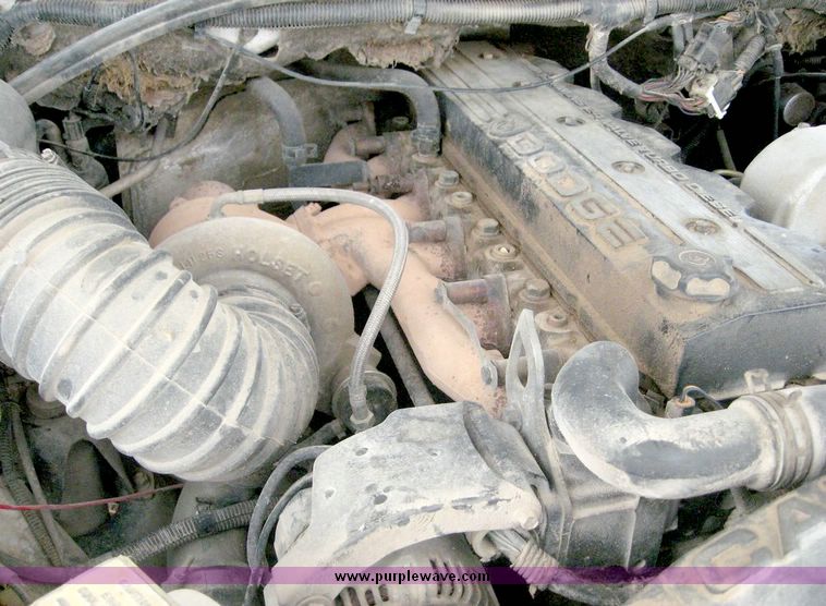 image for item 8709 2002 Dodge Ram 2500 pickup truck with flat bed