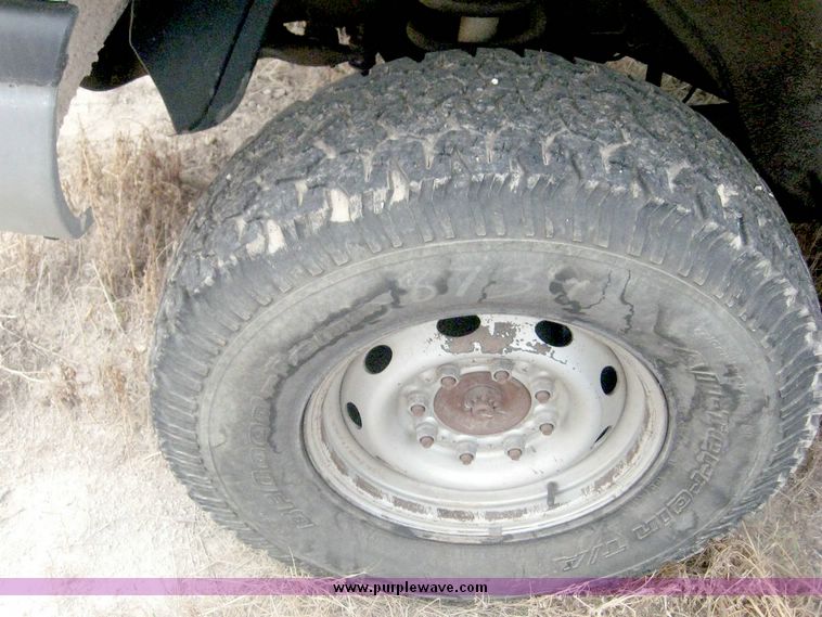 image for item 8709 2002 Dodge Ram 2500 pickup truck with flat bed