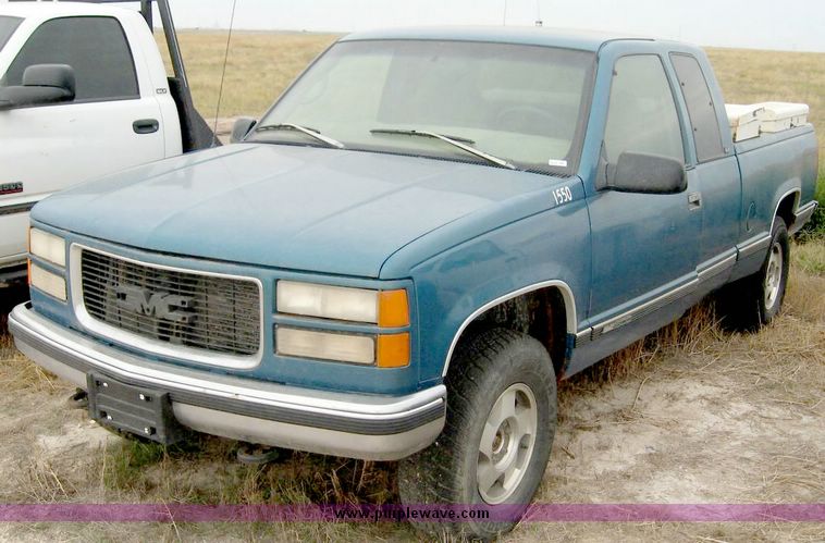 image for item 8710 1997 GMC Sierra K1500 extended cab pickup truck with two tool boxes