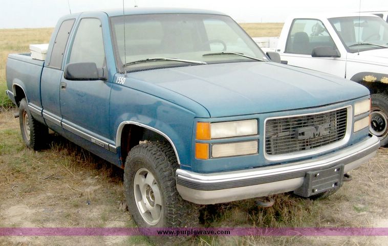 image for item 8710 1997 GMC Sierra K1500 extended cab pickup truck with two tool boxes