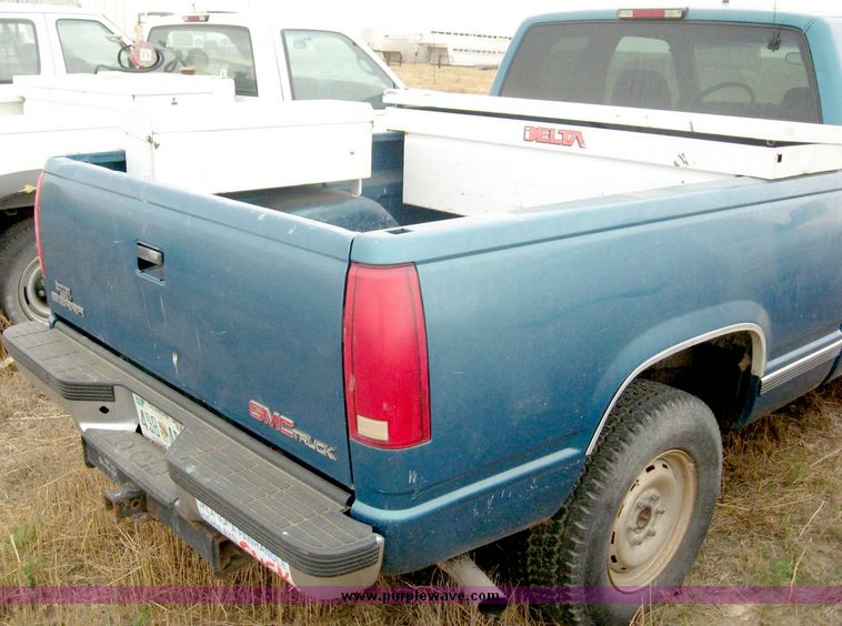 image for item 8710 1997 GMC Sierra K1500 extended cab pickup truck with two tool boxes