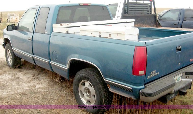 image for item 8710 1997 GMC Sierra K1500 extended cab pickup truck with two tool boxes