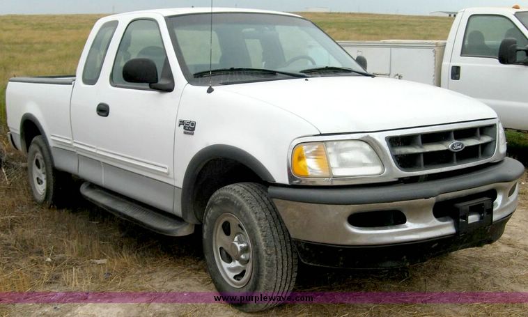 image for item 8718 1998 Ford F150 extended cab pickup truck
