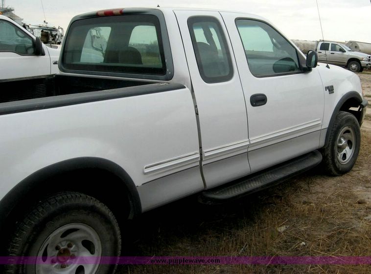 image for item 8718 1998 Ford F150 extended cab pickup truck