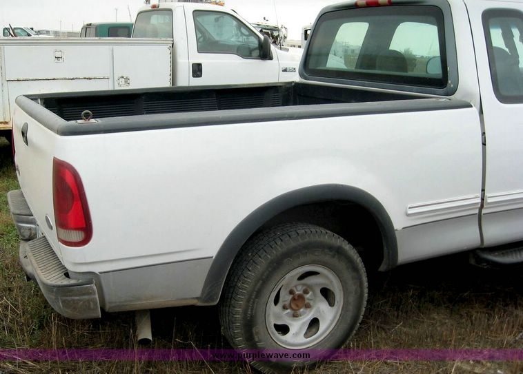 image for item 8718 1998 Ford F150 extended cab pickup truck