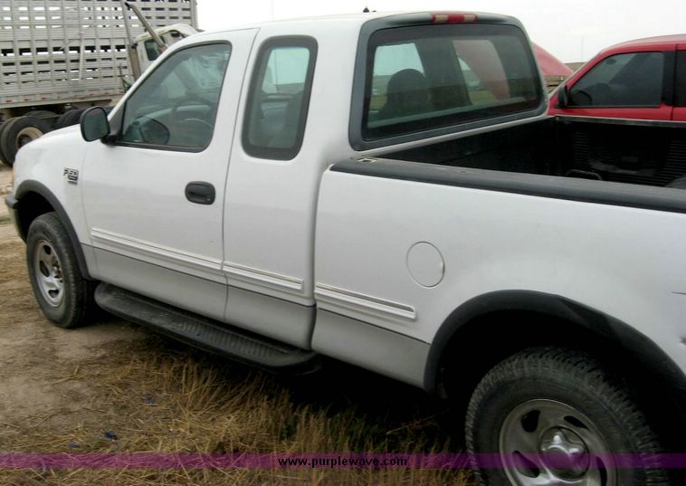 image for item 8718 1998 Ford F150 extended cab pickup truck