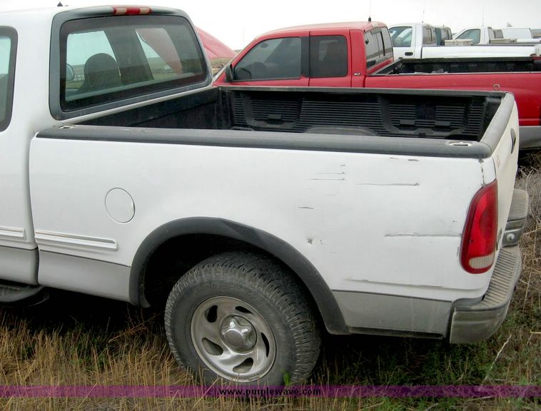 image for item 8718 1998 Ford F150 extended cab pickup truck