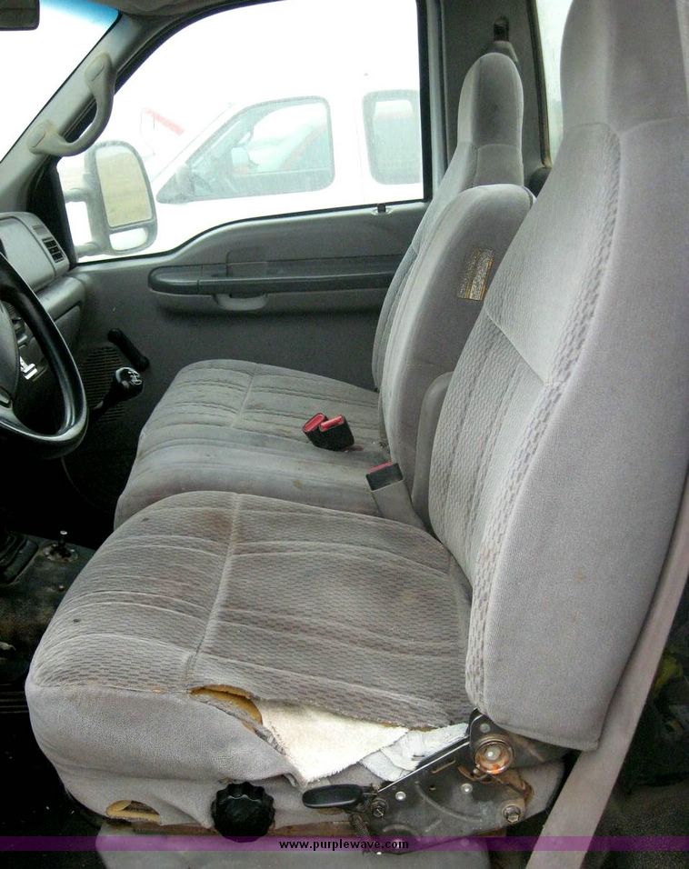 image for item 8719 1999 Ford F350 super duty pickup truck with utility bed