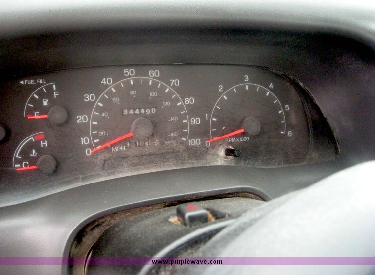 image for item 8719 1999 Ford F350 super duty pickup truck with utility bed