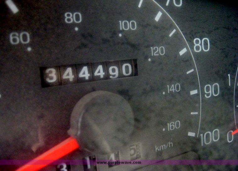 image for item 8719 1999 Ford F350 super duty pickup truck with utility bed