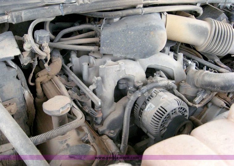 image for item 8719 1999 Ford F350 super duty pickup truck with utility bed