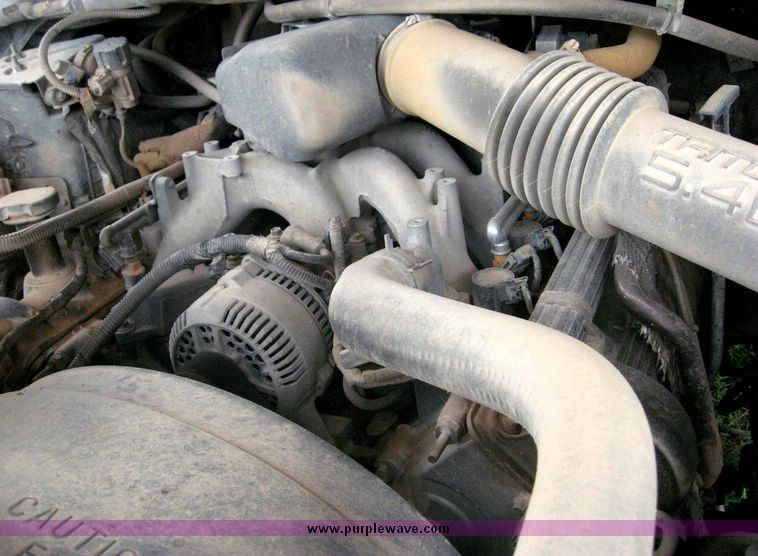 image for item 8719 1999 Ford F350 super duty pickup truck with utility bed