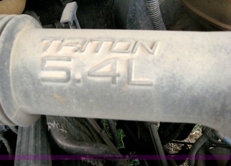 image for item 8719 1999 Ford F350 super duty pickup truck with utility bed