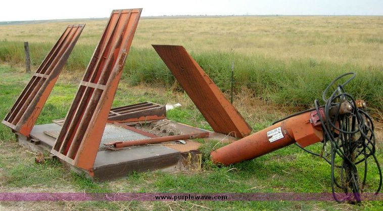 image for item 8721 Baasch & Sons Inc. drive truck unloading hopper