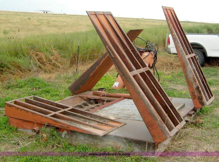 image for item 8721 Baasch & Sons Inc. drive truck unloading hopper