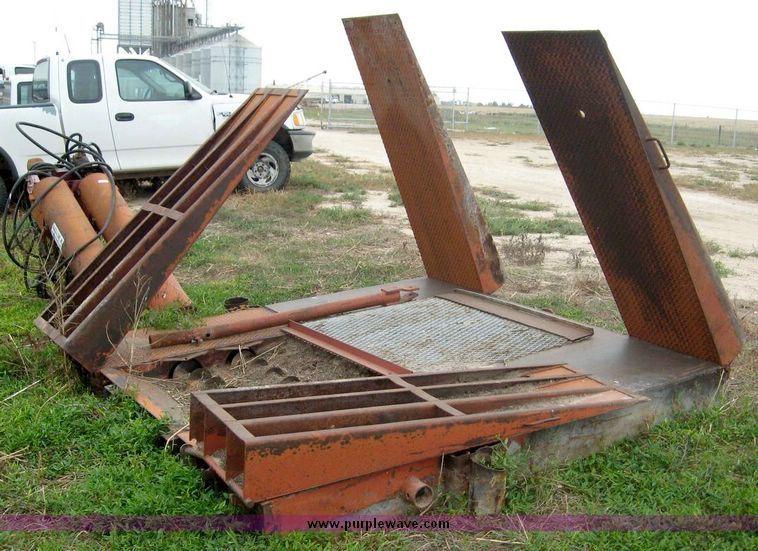 image for item 8721 Baasch & Sons Inc. drive truck unloading hopper