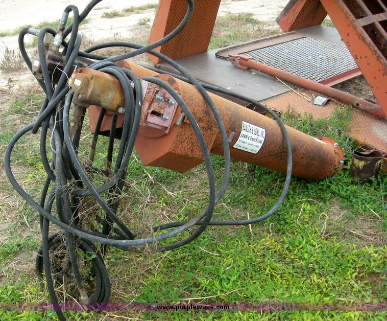 image for item 8721 Baasch & Sons Inc. drive truck unloading hopper