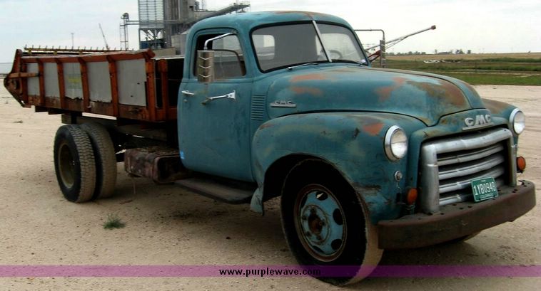 image for item 8728 1948 GMC truck with Farm hand manure spreading box