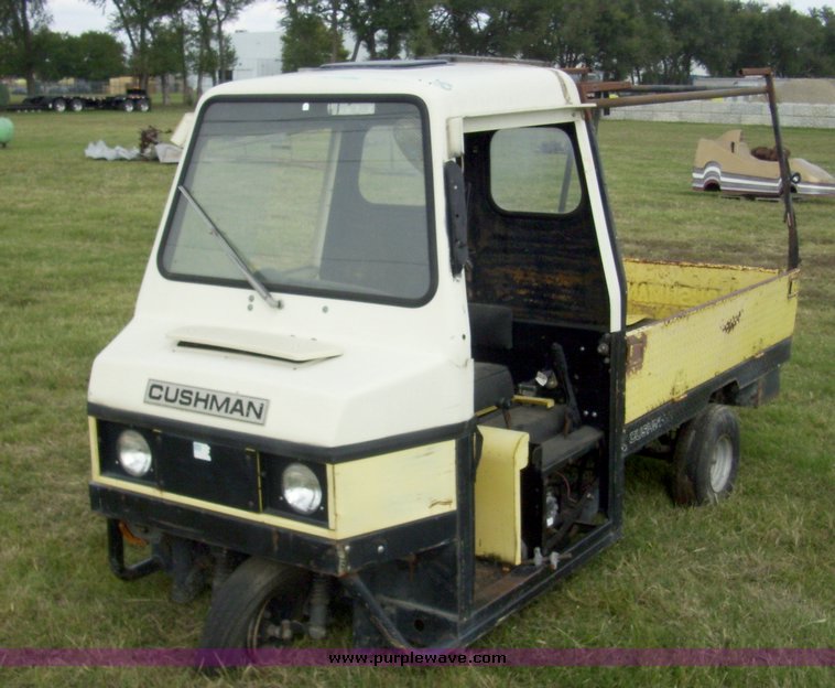 image for item 7326 Cushman three wheel full ton hauler