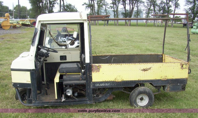 image for item 7326 Cushman three wheel full ton hauler