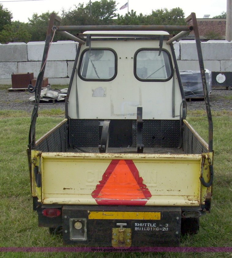 image for item 7326 Cushman three wheel full ton hauler