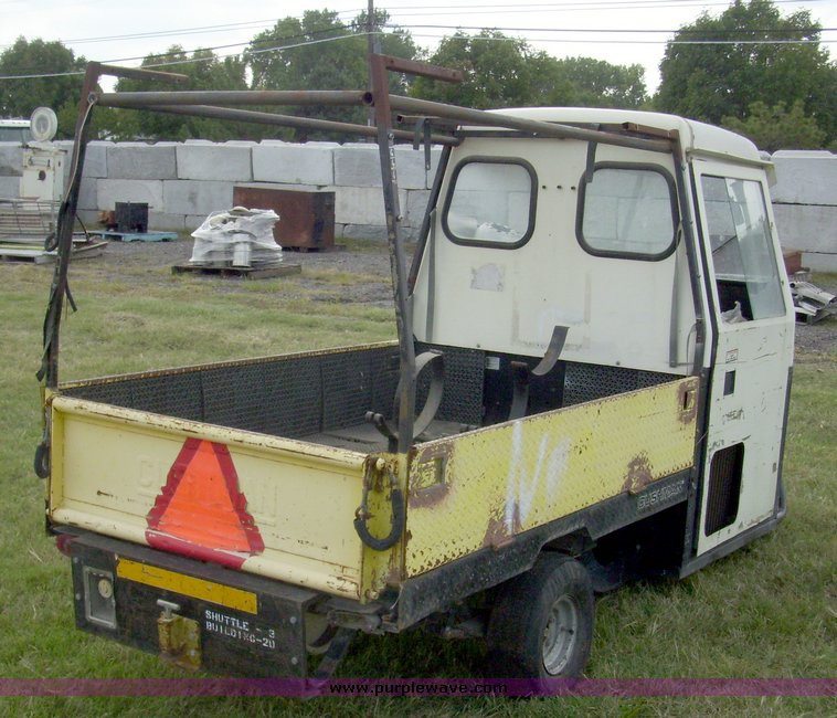 image for item 7326 Cushman three wheel full ton hauler
