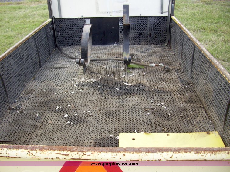 image for item 7326 Cushman three wheel full ton hauler