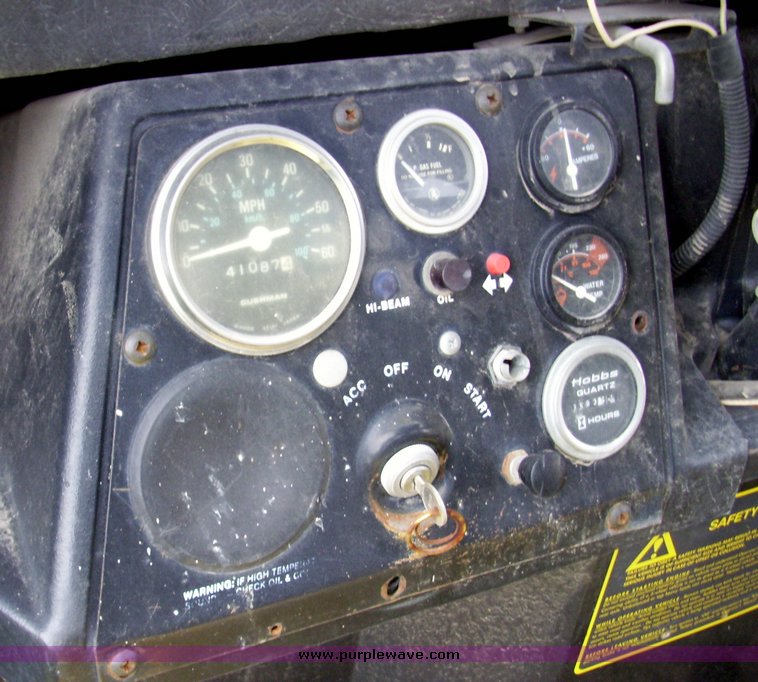 image for item 7326 Cushman three wheel full ton hauler