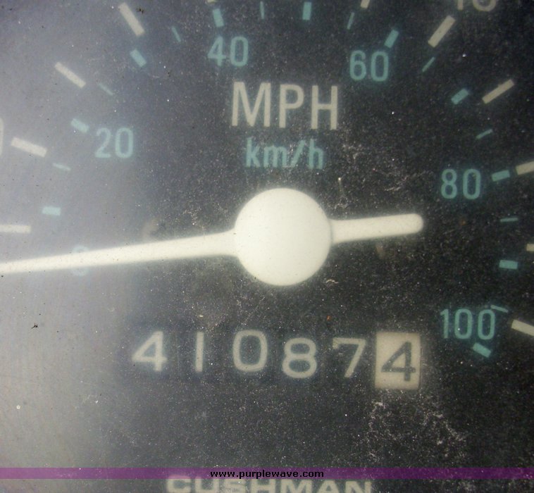 image for item 7326 Cushman three wheel full ton hauler