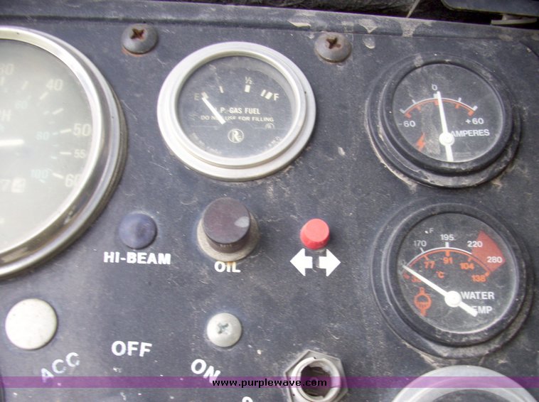 image for item 7326 Cushman three wheel full ton hauler