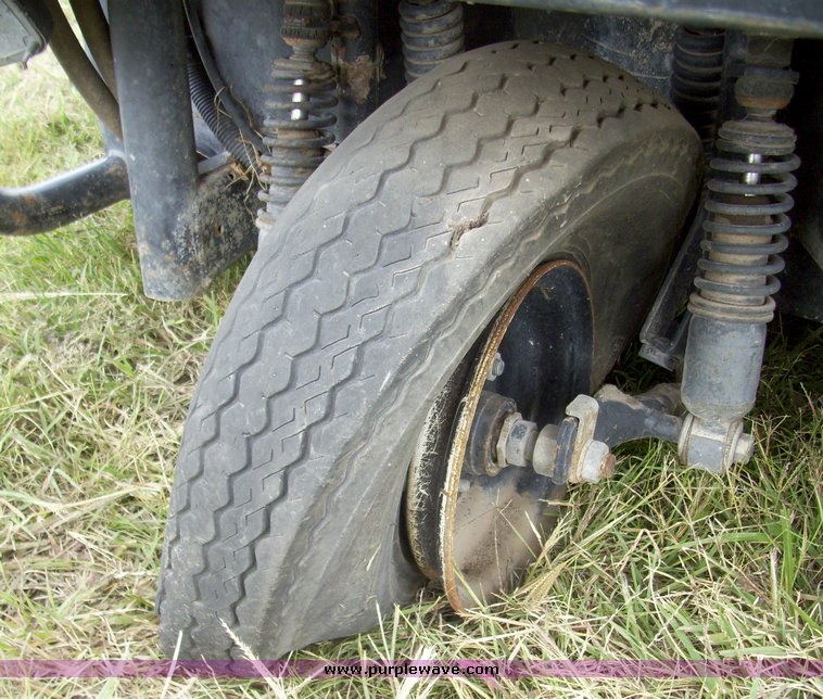 image for item 7326 Cushman three wheel full ton hauler