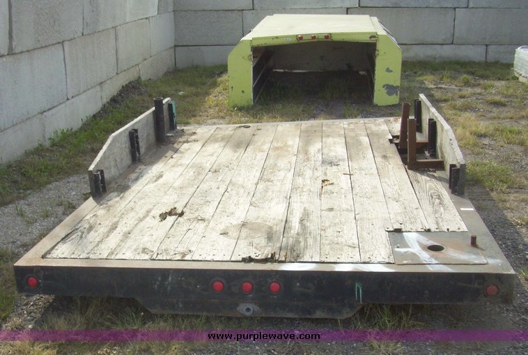 image for item 7335 11' x 7' flat bed