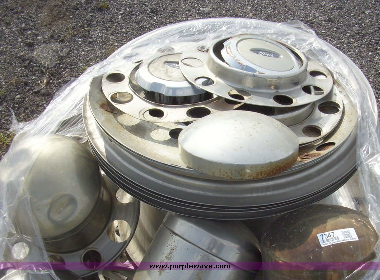 image for item 7347 (2) pallets of hubcaps and wheel centers