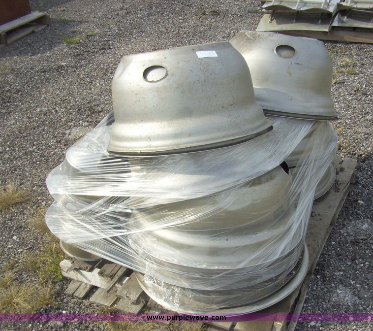 image for item 7347 (2) pallets of hubcaps and wheel centers