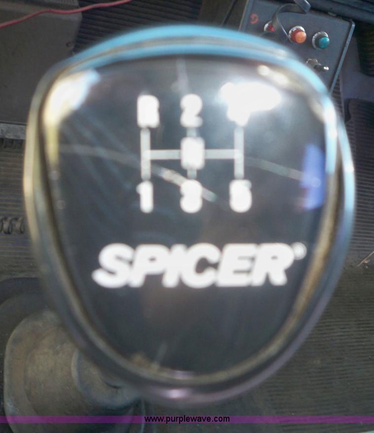 image for item 7399 1997 International 4700 rollback wrecker