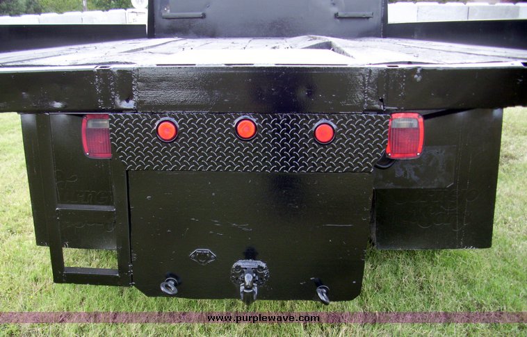 image for item 7328 1990 International Series 4700 crew cab flatbed