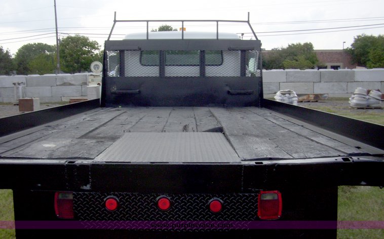 image for item 7328 1990 International Series 4700 crew cab flatbed