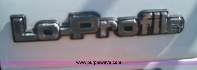 image for item 7401 2000 International 4700 Lo-Profile T444E truck