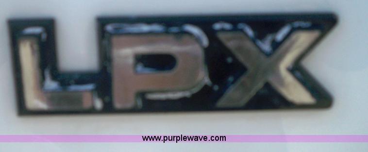 image for item 7401 2000 International 4700 Lo-Profile T444E truck