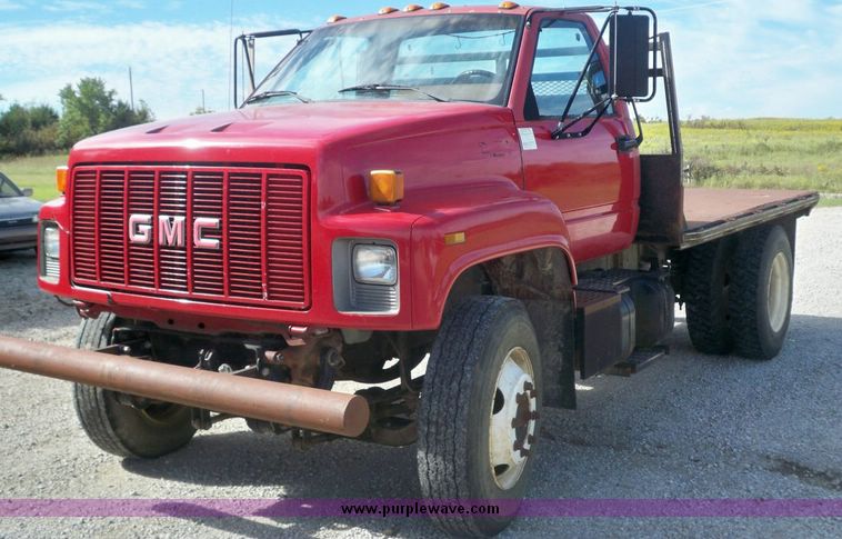 image for item 7411 1992 GMC Topkick truck with 12' flatbed