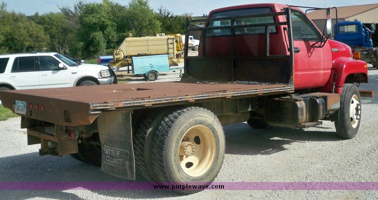 image for item 7411 1992 GMC Topkick truck with 12' flatbed