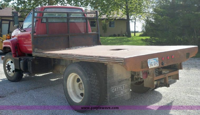 image for item 7411 1992 GMC Topkick truck with 12' flatbed