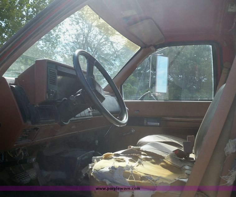 image for item 7411 1992 GMC Topkick truck with 12' flatbed