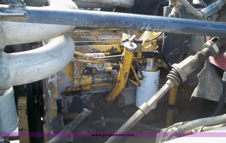 image for item 7411 1992 GMC Topkick truck with 12' flatbed