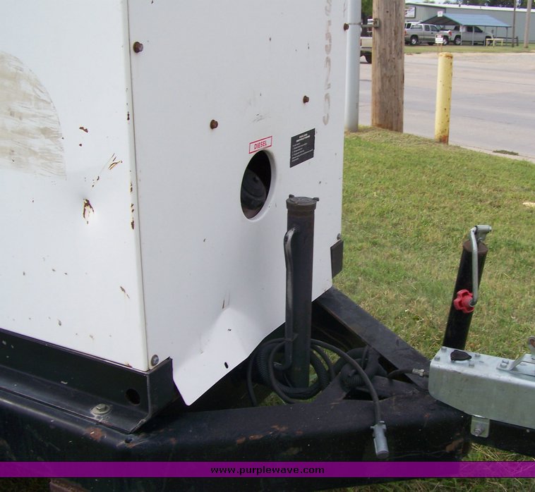 image for item 8616 Muitquipe 70 KV Whisperwatt generator on trailer